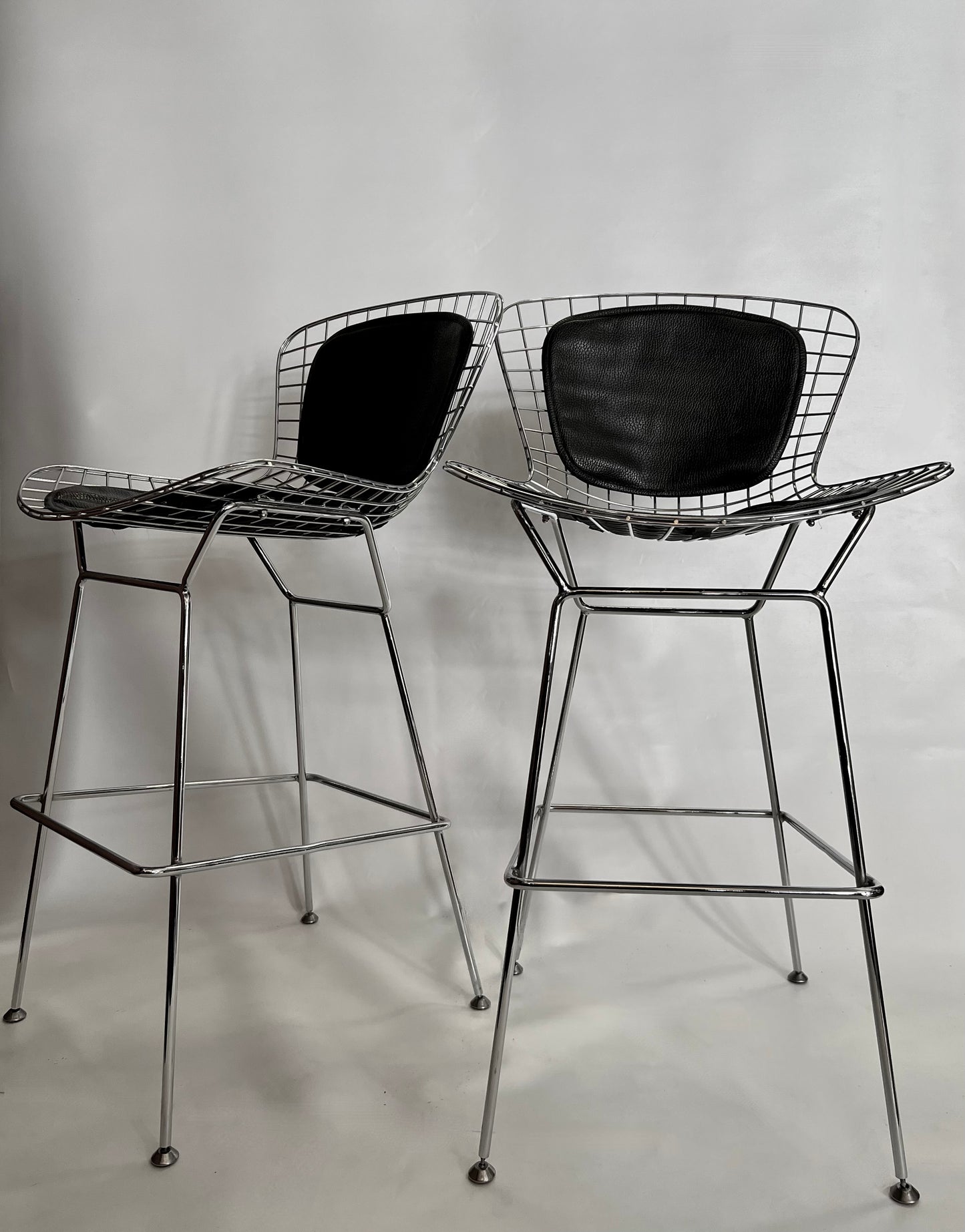 PAIR BERTOIA STYLE CHROMED WIRE BAR STOOLS  with BLACK BIKINI CUSHIONS