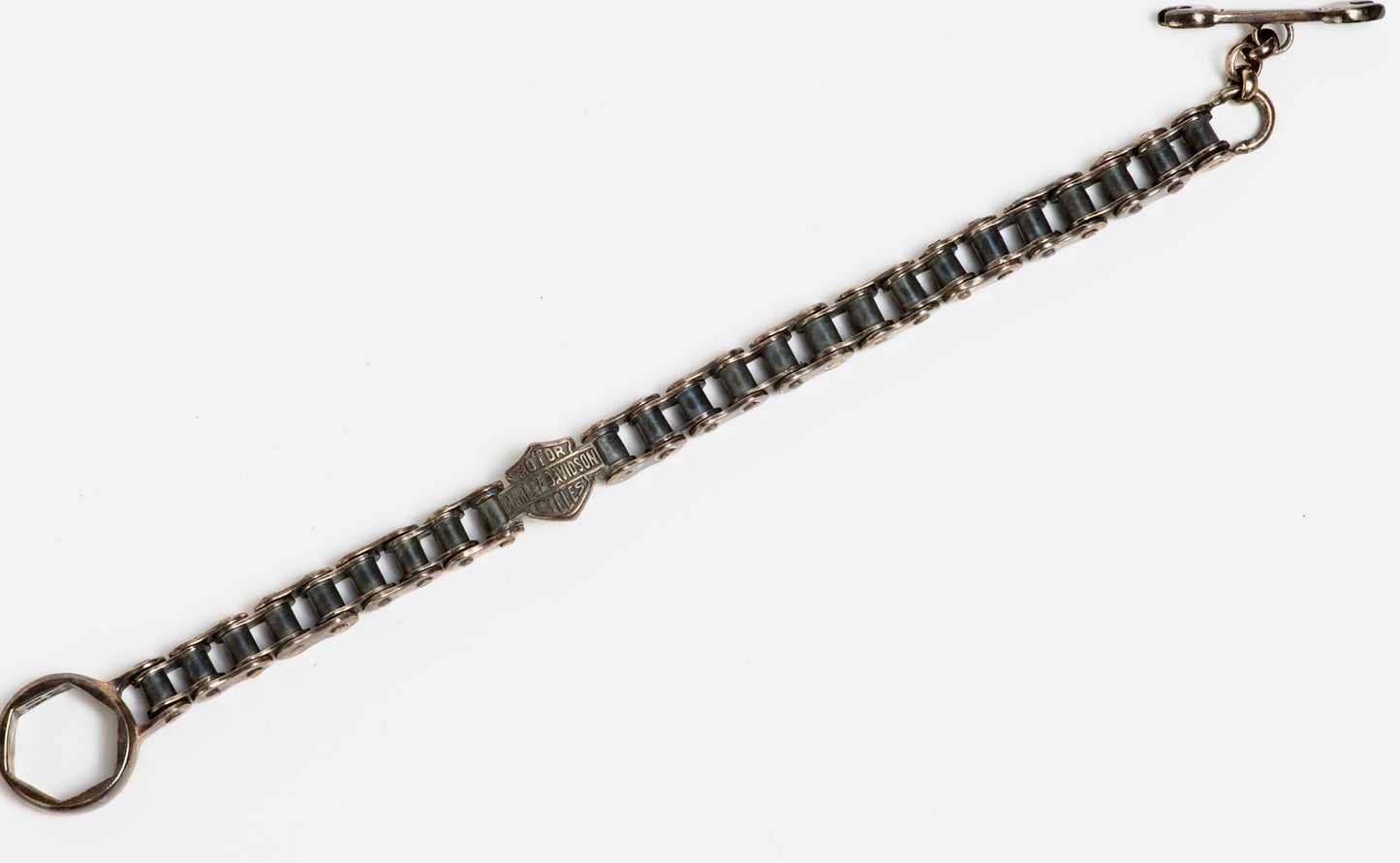HARLEY DAVIDSON MOTORCYCLE 
BIKE CHAIN 
STERLING BRACELET W/ WRENCH & NUT TOGGLE CLOSURE 
NEW OLD STOCK 
ORIGINAL BOX