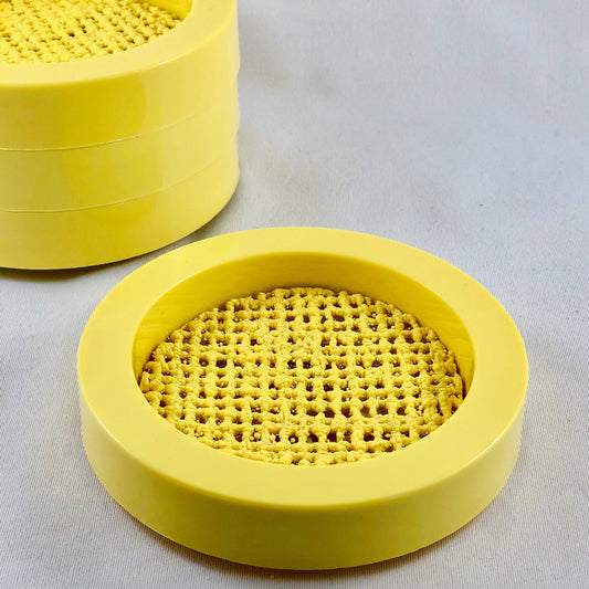 1960/ 70's YELLOW PLASTIC STACKING COASTERS -SET OF 4