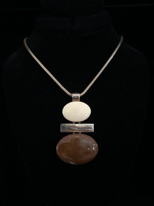 MOD GRAPHIC LUCITE PENDANT AND GOLDTONE NECKLACE